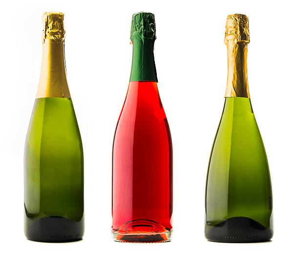 Assorted champagne Champagne bottles isolated on white rose champagne stock pictures, royalty-free photos & images