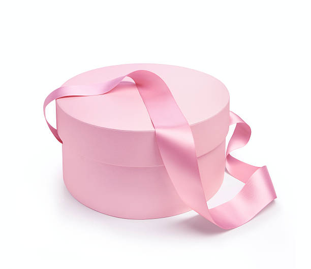 Gift round shape box in pink color. White background