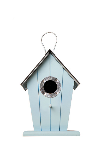Blue wooden nest box for birds. White background. Bird house.