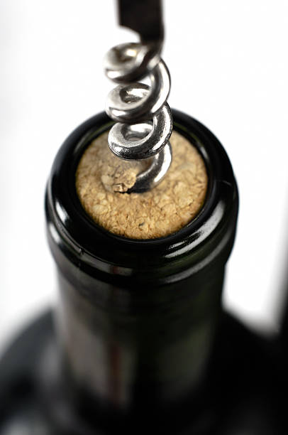 istock corkscrew and bottle of wine 483121894