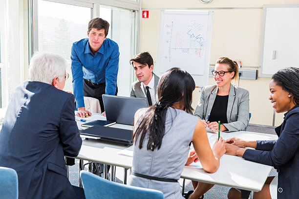 istock Business people in education room working and talking about problems 483124478