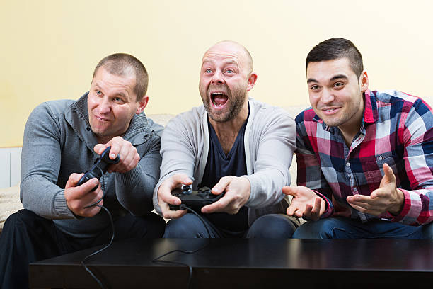 istock Friends relaxing with video game 483124652