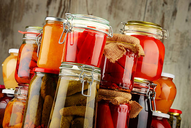 istock Jars with pickled vegetables and fruity compotes 483127444