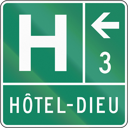 Guide sign in Quebec, Canada - Hospital on the left. The text means hospital.