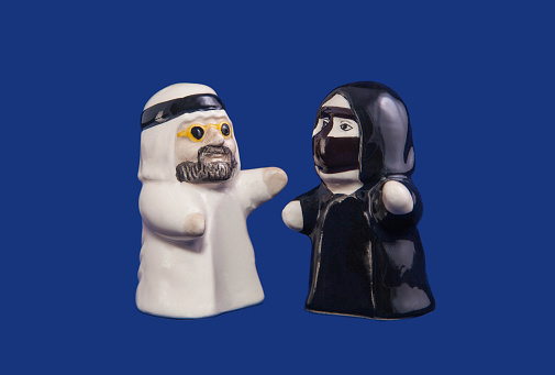 The Arab figurines for salt and pepper in national suits.