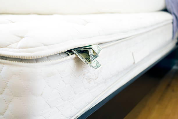 istock Cash hidden under the mattress 483132951