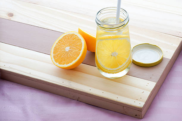 Infused water orange citrus Mug stock photo