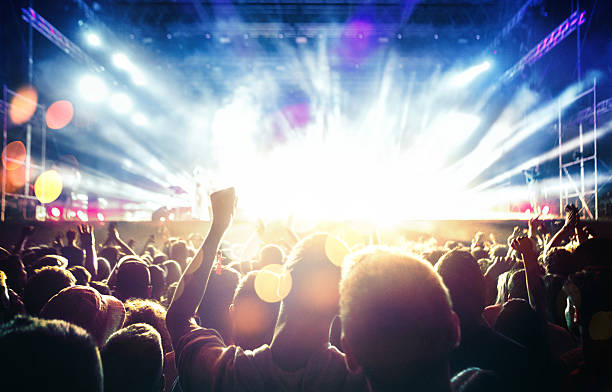 istock People at concert party. 483134252