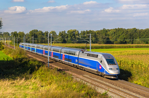 Strasbourg, France - September 22, 2013: SNCF TGV Euroduplex train on a way from Strasbourg to Paris. The second phase of high-speed railway between Strasbourg and Paris \
