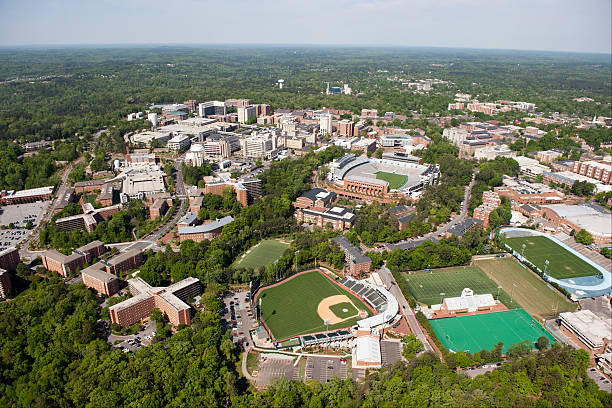 University of North Carolina - Aerial View An aerial view of the University of North Carolina campus and surrounding area on April 21, 2013 in Chapel Hill, North Carolina. university of north carolina photos stock pictures, royalty-free photos & images