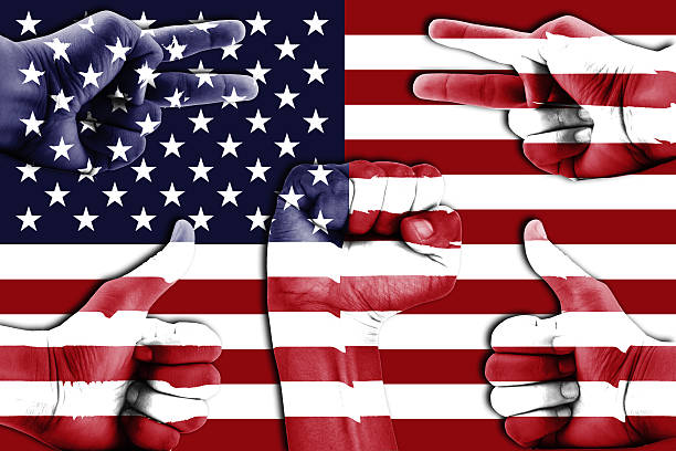 istock hands on United States flag background 483139584