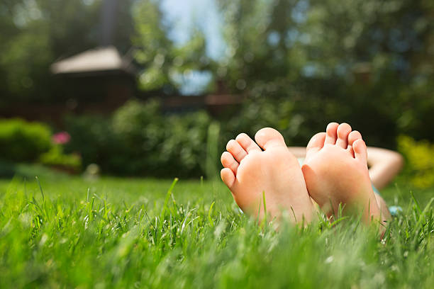 istock Little feet on the grass, close up photo 483144942