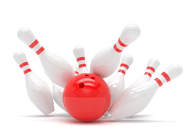 istock Bowling ball and scattered skittles 483146258