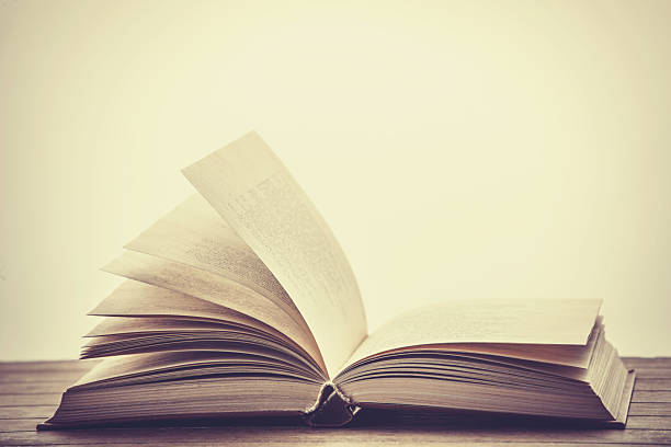 istock Open book. Photo in old color image style. 483146945