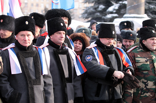 Moscow, Russia - February 04, 2012: Cossacks stay on the meeting for supporting of Vladimir Putin