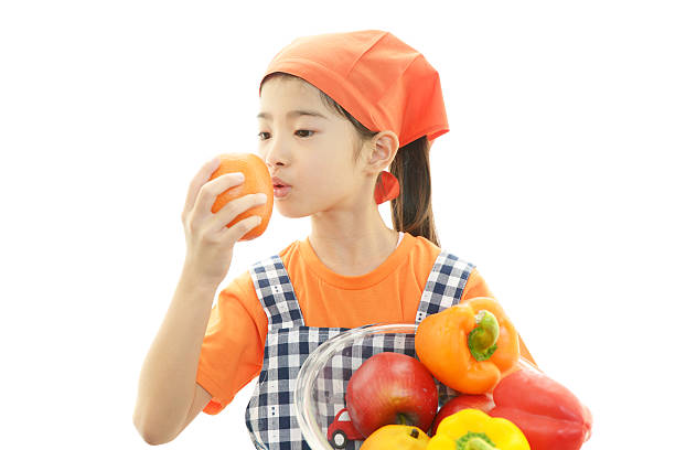 Cooking girl in apron isolated on white background