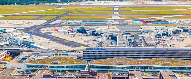 aerial view of Airport Frankfurt with terminal 1 Frankfurt, Germany - September 20, 2012: aerial view of Airport Frankfurt with terminal 1 in Frankfurt, Germany. Terminal 1 houses Lufthansa and other Star Alliance partners. frankfurt international airport stock pictures, royalty-free photos & images