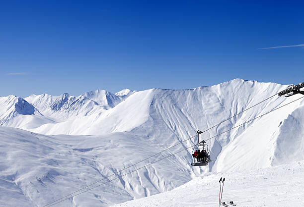 istock Skiers on ropeway at ski resort Gudauri 483149290