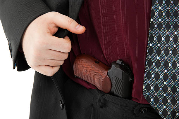 istock Makarov pistol in his pants 483151223