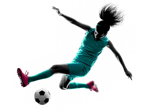 teenager girl child  soccer player isolated silhouette one teenager girl child  playing soccer player in silhouette isolated on white background soccer player photos stock pictures, royalty-free photos & images