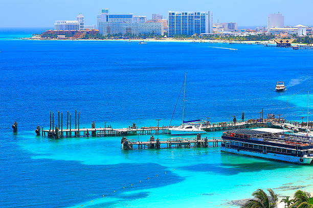 Cozumel, Mexico -- March 4, 2025: Enchantment of the Seas is a cruise ship operated by Royal Caribbean International. The cruise ship is docked at the popular cruise port of Cozumel, Mexico. Launched in 1997, it has a capacity of nearly 3,000 passengers. The Enchantment of the Seas offers a variety of activities for all ages.