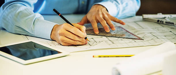 istock Wide shot of architect working in office 483154848