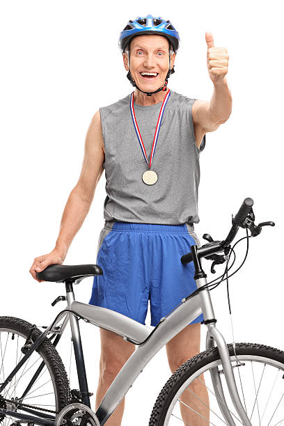 istock Senior cyclist with a medal giving a thumb up 483160826