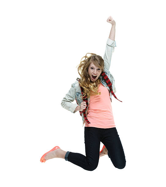 Cheerful female student jumping and cheeringhttp://www.twodozendesign.info/i/1.png