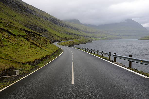 istock Winding Road By Mountains and Ocean 483162280