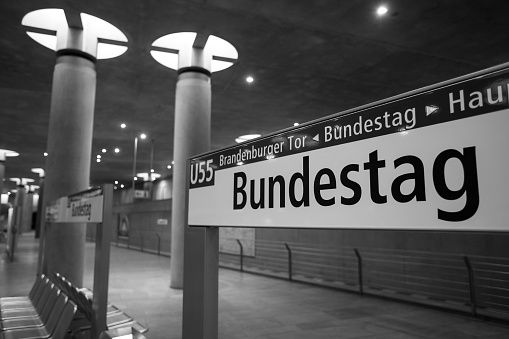 subway sign of  the german bundestag in berlin in black and white