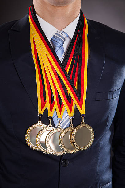 istock Businessman Wearing Gold Medals 483164624