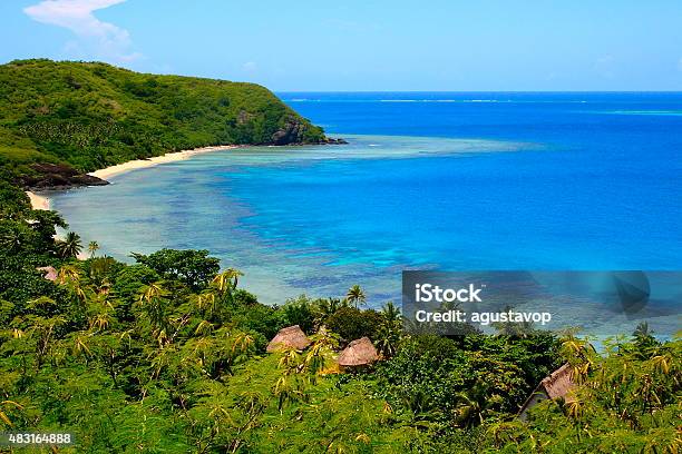 Paradise Above Fiji Yasawa Islands Deserted Turquoise Beach And Palapas Stock Photo - Download Image Now