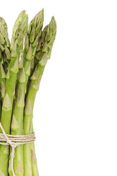 istock uncooked green asparagus tied with twine 483166311