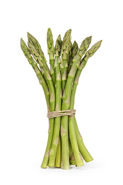 istock uncooked green asparagus tied with twine 483166315