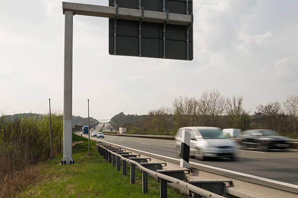 istock cars on a german highway under sign 483166395