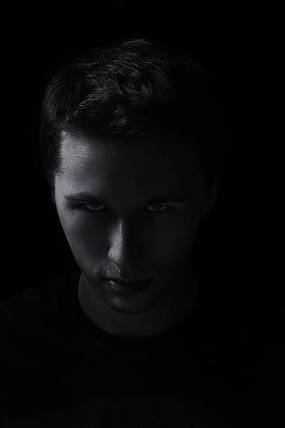 istock unkind man portrait in the darkness 483166523