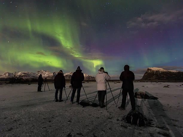 istock Photographer in front of breathtaking aurora 483169543