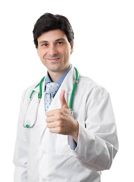 istock friendly doctor smiling giving thumbs up 483169783