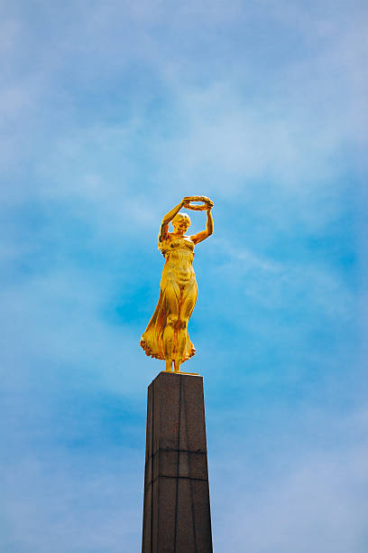 Luxembourg city, Luxembourg - June 17, 2015: Monument of Remembrance (Gelle Fra, Golden Lady) is memorial dedicated to Luxembourgers who volunteered for service in armed forces of Allied Powers during WWI.