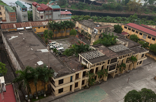 Hanoi, Vietnam - February 28, 2015: View from above of a prison located among a civilian area in the suburb of Hanoi capital, Vietnam.