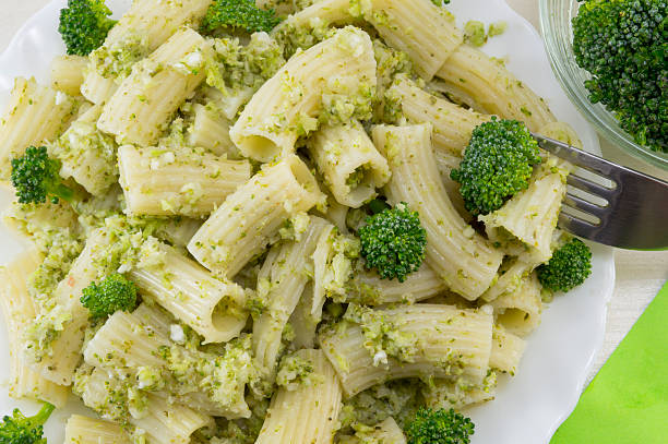 istock Pasta with broccoli served with cooked broccoli close up 483177886
