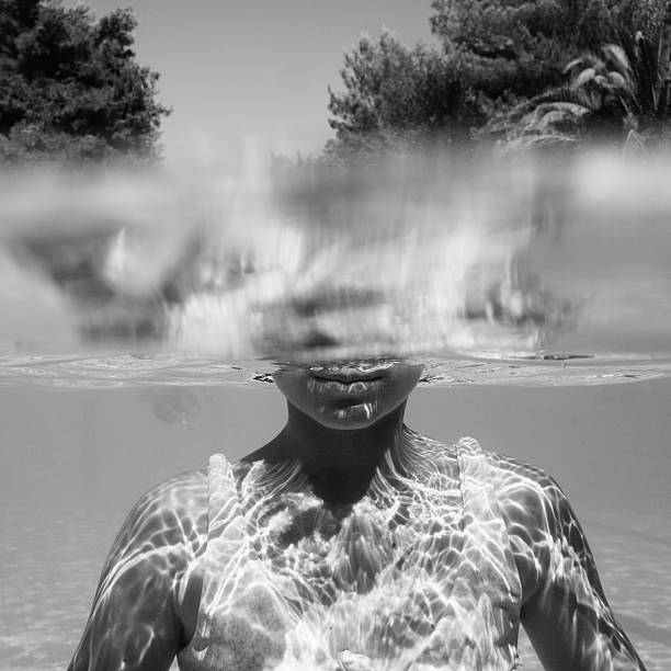 istock Underwater Young Girl Swimming 483178086