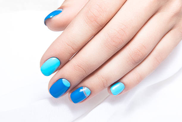 istock Blue manicure in light and dark colors of lacquer on 483184682