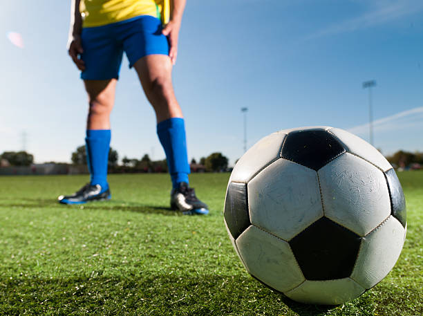 istock Soccer Player Kicking a Ball 483184893