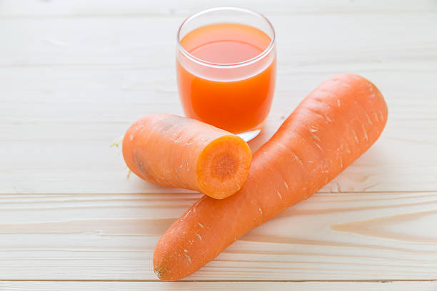 istock fresh carrot and carrot juice 483185534