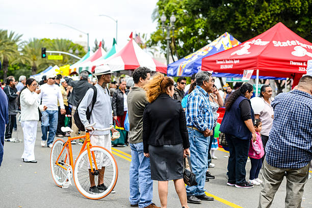 Los Angeles, USA - May 5, 2013: Cinco De Mayo Celebration in Los Angeles, USA, crowds of people in El Pueblo district of Los Angeles, watching shows, buying gifts and having fun.