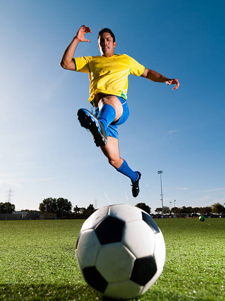 istock Soccer Player Kicking a Ball 483185701