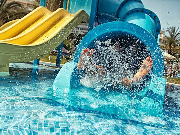 Photo of Little girl in water park