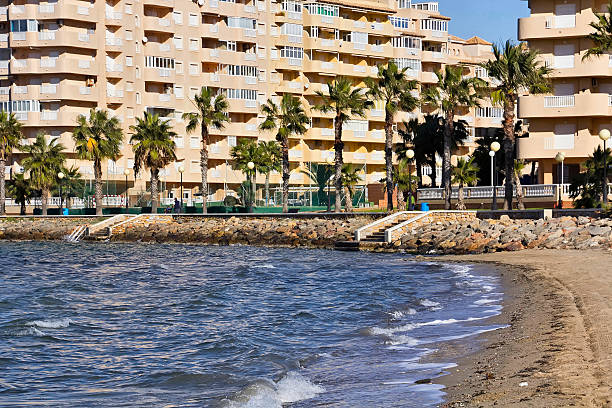 istock tourist beach with buildings 483186065