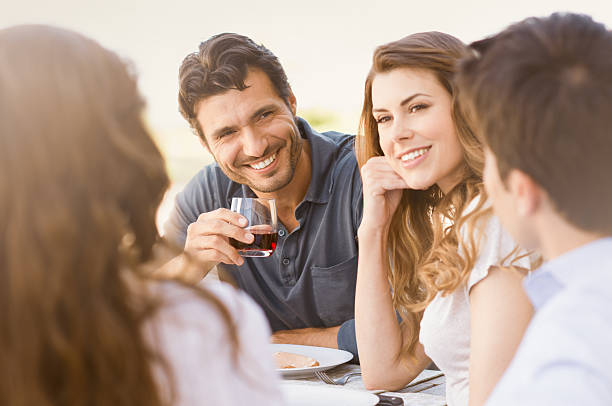 istock Happy Friends Enjoying Dinner 483187711